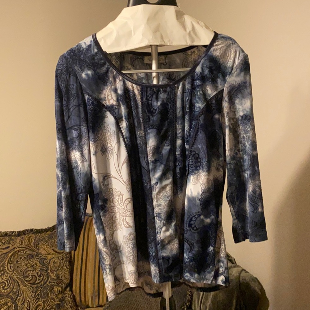 Blue and white shirt.